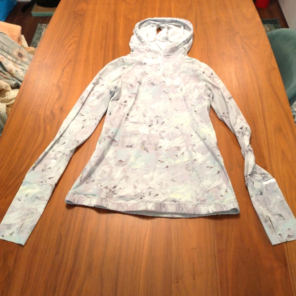 Lululemon EUC grey floral 1/2 zip hoodie size 6. I have matching shorts for set!